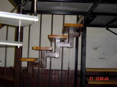 metalic construction of staircase with oak stages