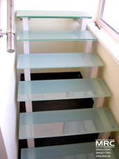 Glass stairs and handrailing from polished stainless steel