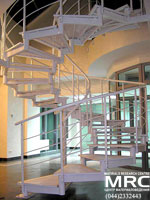 Spiral metalic staircase in building