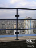 Balcony rail, glass fittings on the 24 stage ( black metall with a powder coating , safe tempered rchitectural glass )