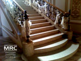 Staircase with forged balusters and oak handrailing