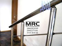 Baluster from polished stainless steel and it's mounts