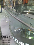 All-glass fencing with a stainless steel rails 