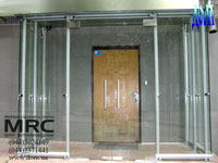 Glass entrance lobby produced from back metal and tempered glass 